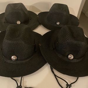 Four black straw hats